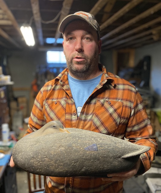 Mike Braun Holding Dads Decoy